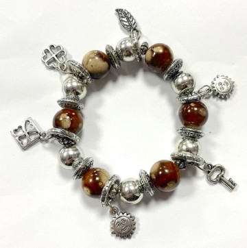 Armband sleutel zon blaadje klavertjes vier